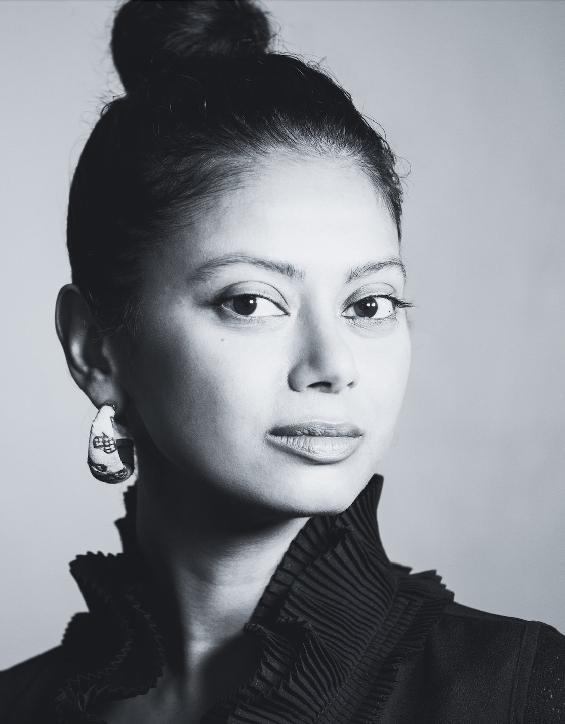 Grace Anezia Ali, Scholar & Author