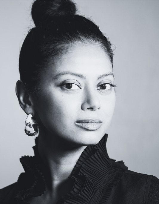 Grace Anezia Ali, Scholar & Author